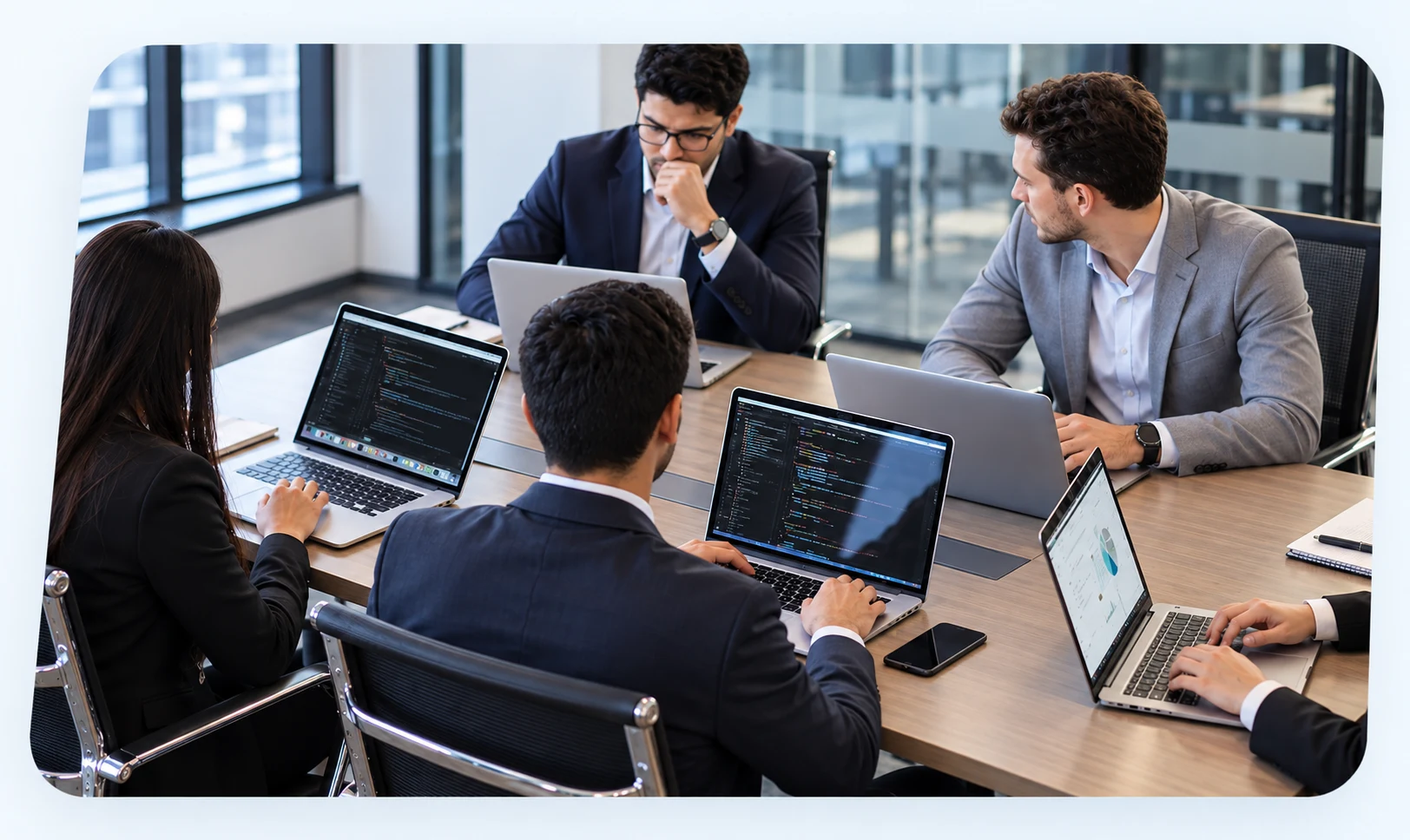 Technology professionals collaborating in a modern workplace